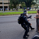Evans’s arrest from another angle. Photo via AP.